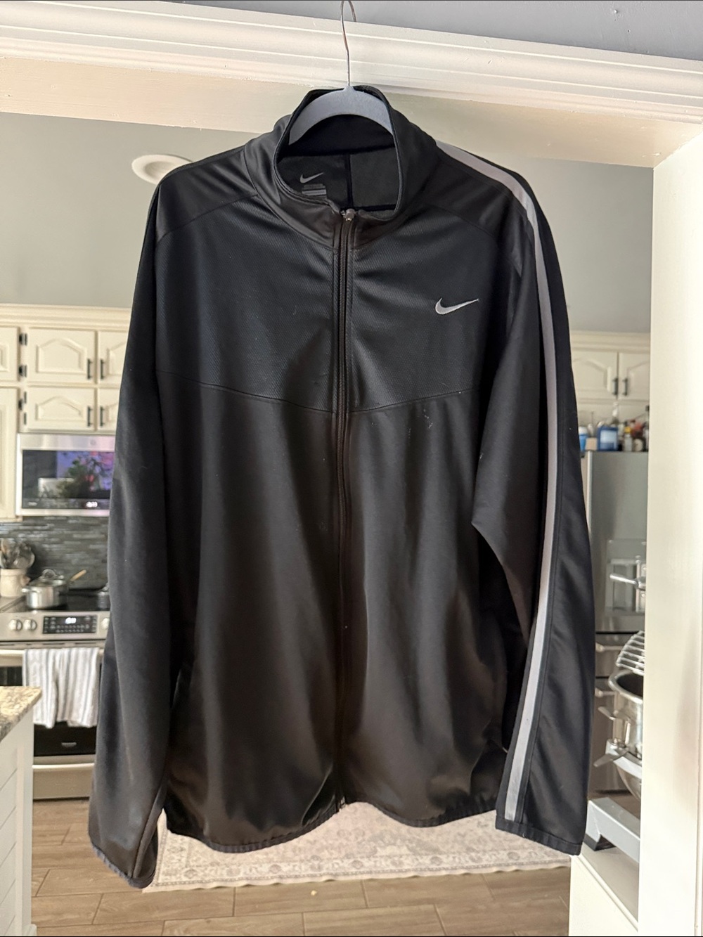 Nike Black Track Jacket with Gray Sleeve Stripe